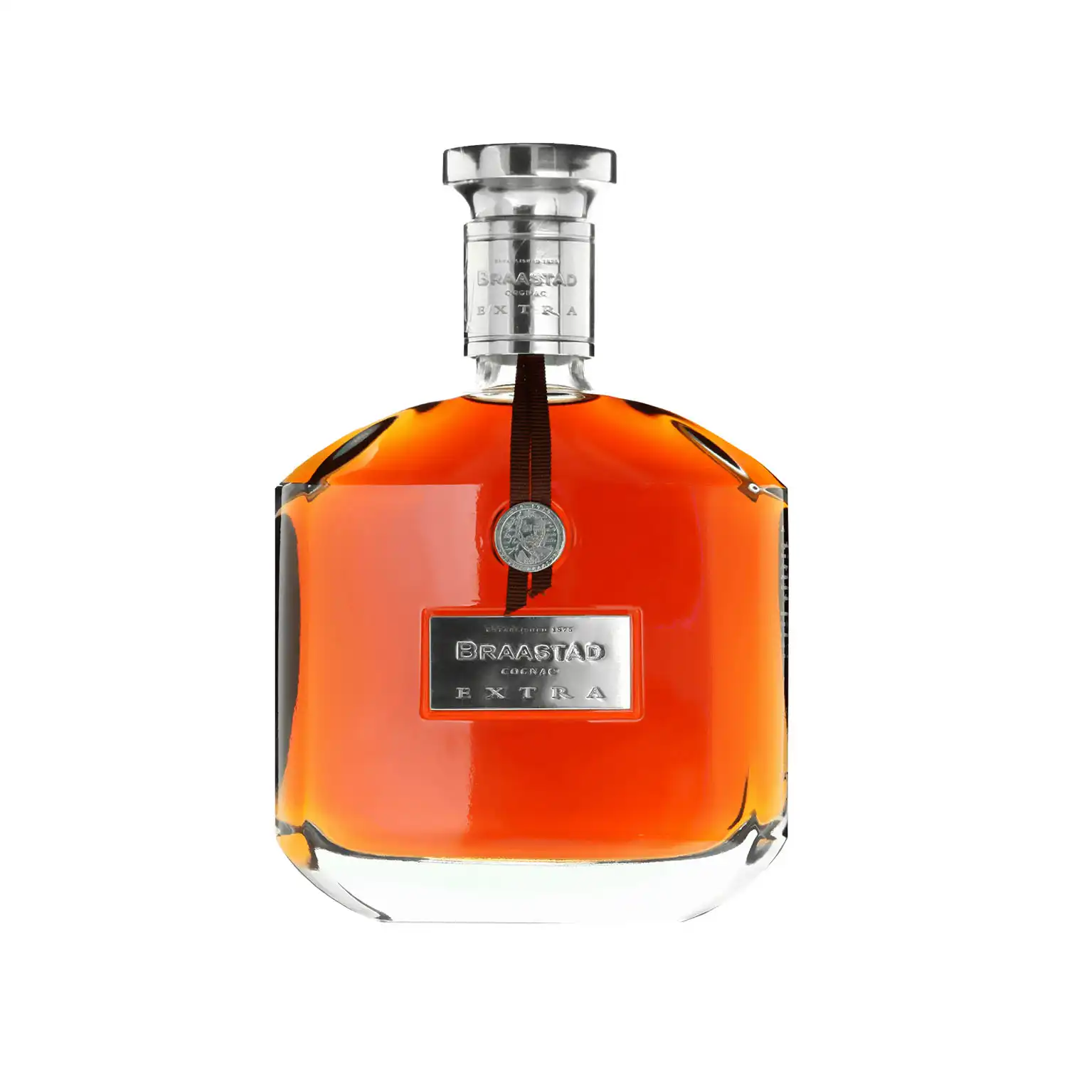 Braastad Extra – cognac i lyxig, bred kristallflaska med silverdetaljer och stor kork